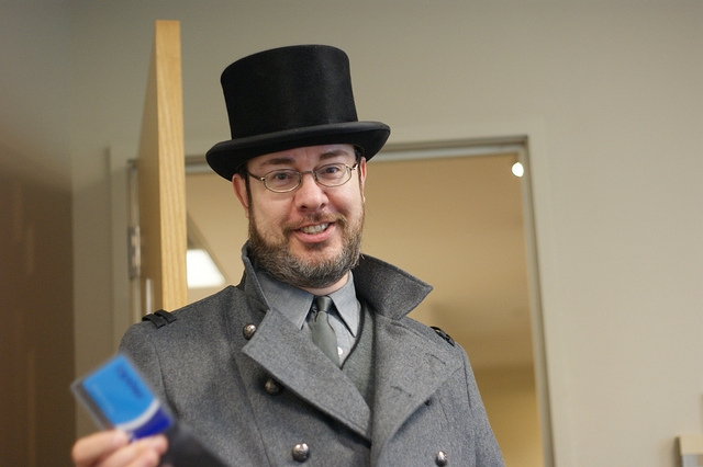 top hat coat & oyster card
